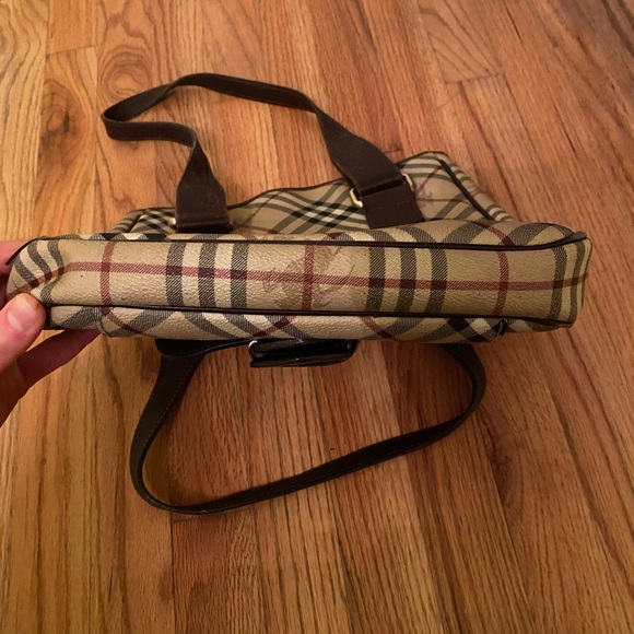 Burberry purse with browns leather straps and snap front with opening - Picture 9 of 13